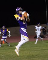 Lemoore's Jace Silva intercepts a Washington Union pass late in the game, a big win for the Tigers.